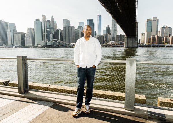 Ta-Nehisi Coates with the New York City skyline behind him.