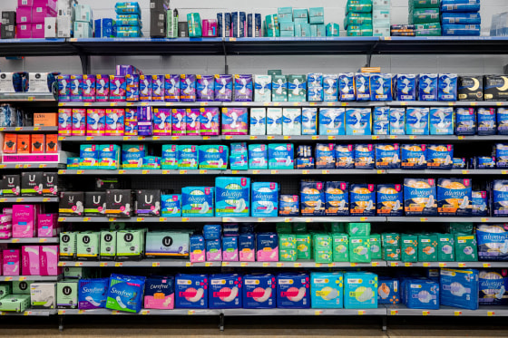 Women's hygiene products on a store shelf.