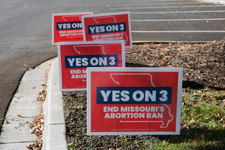 'Yes on 3' signs