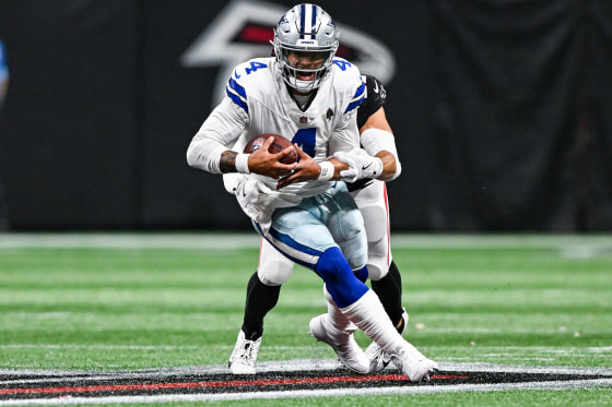 Dallas quarterback Dak Prescott runs with the ball