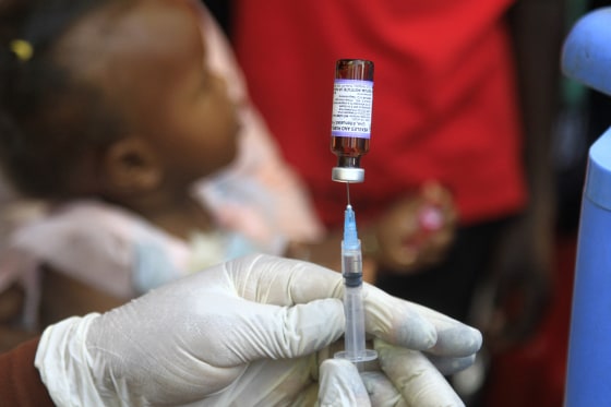 A Sudanese nurse prepares a vaccine shot in Sudan's Gedaref city on January 22, 2024, during a vaccination campaign against the measles and rubella virus.