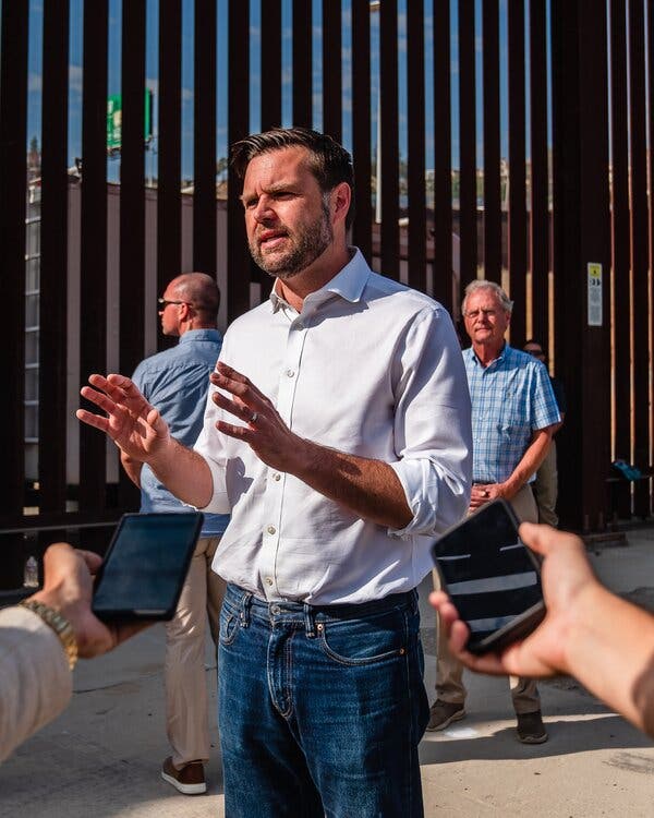 Vice President-elect JD Vance speaking to members of the news media in front of the U.S.-Mexican border.