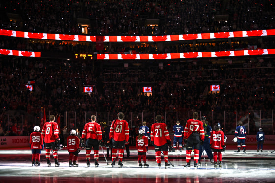 Team Canada stand at their blueline during pre-game ceremonies before the 4 Nations Face-Off Championship game