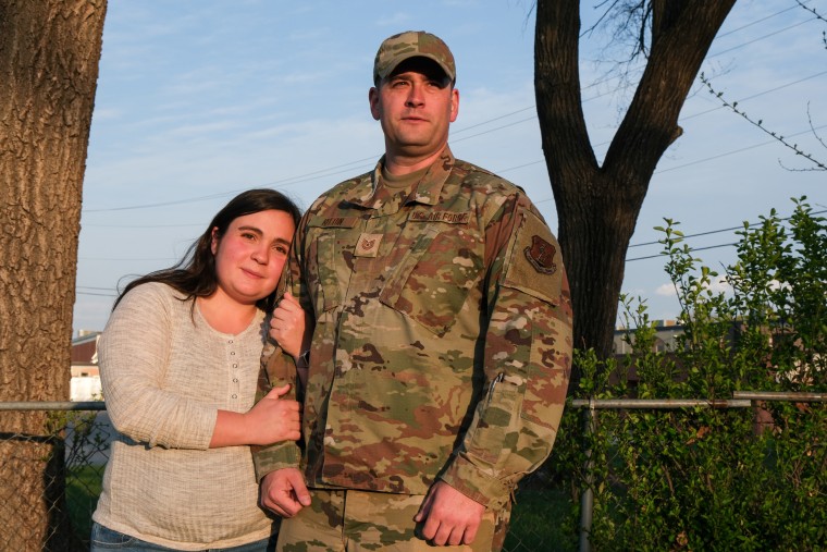 250417-pregnant-women-military-insurance-tricare-audrey-simmons-family-3-se-219a-21df03 Audrey Simmons and TSgt. Brandon Keeton pose for a portrait at their home in Kansas City, Missouri on April 9, 2025.
