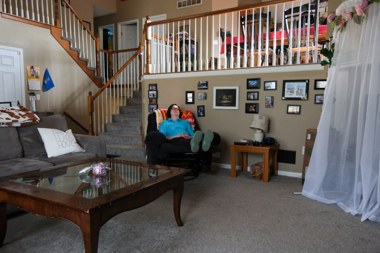 250417-pregnant-women-military-insurance-tricare-cortney-frazon-2-se-219a-20678b Cortney Frazon rests in her home in Lee's Summit, Missouri on April 9, 2025.