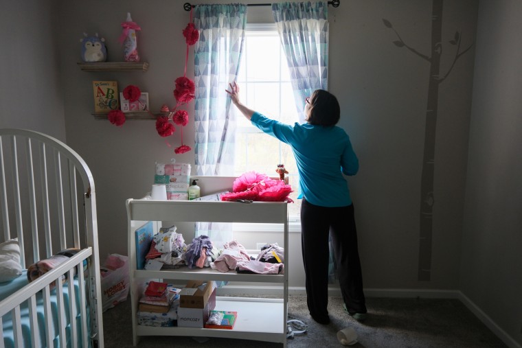 250417-pregnant-women-military-insurance-tricare-cortney-frazon-3-se-219a-f80a30 Cortney Frazon prepares the nursery in her home in Lee's Summit, Missouri on April 9, 2025.